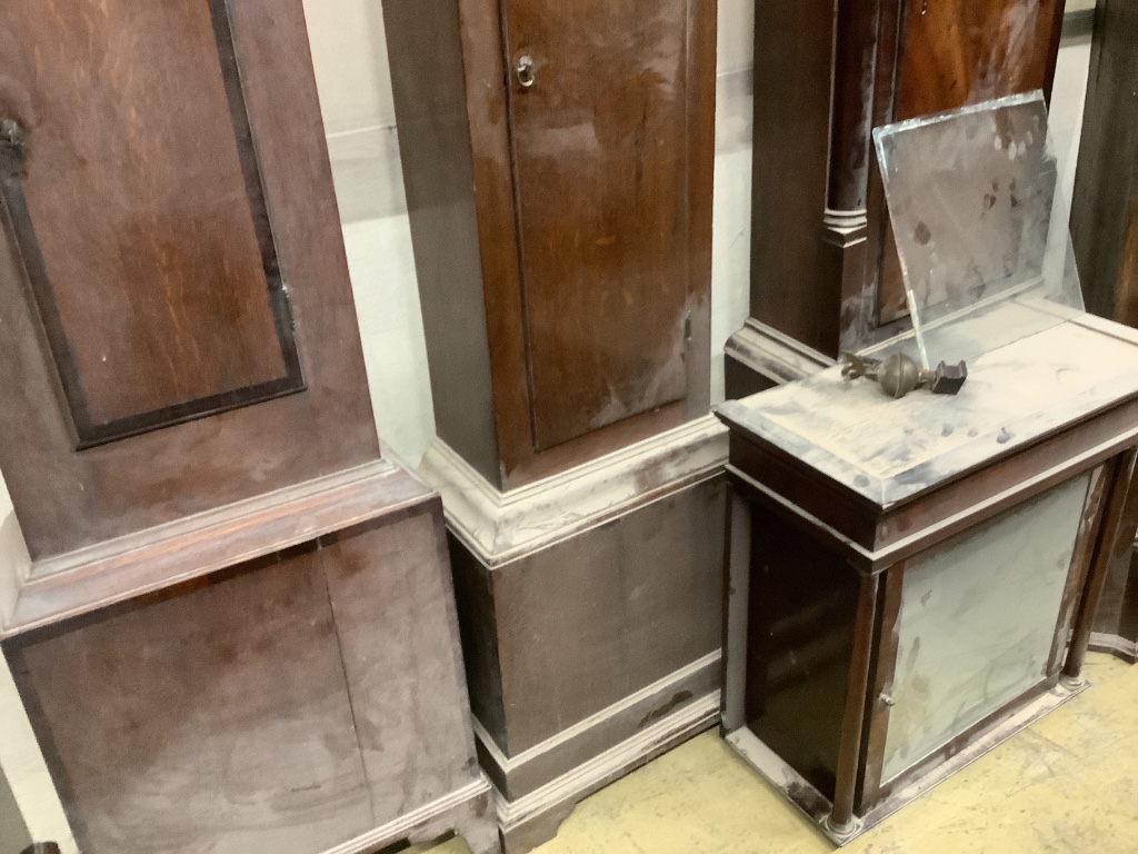 An early 19th century oak eight day longcase clock marked Harley & Son, Salop, together with two oak and mahogany clock cases